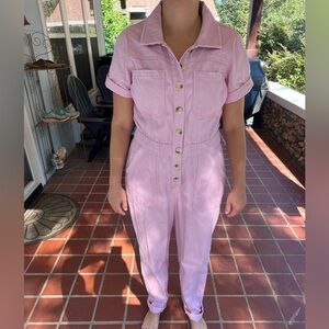 Show me your mumu pink denim jumpsuit. Size large.